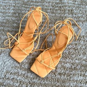 Orange heeled sandals
